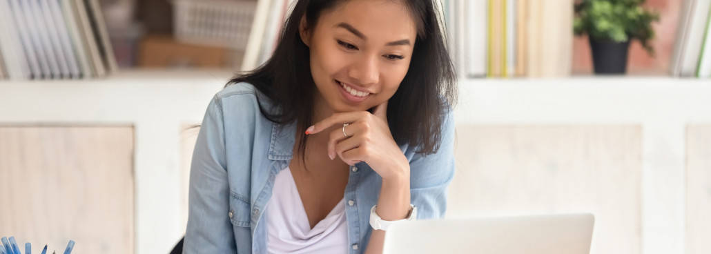 woman looking at laptop