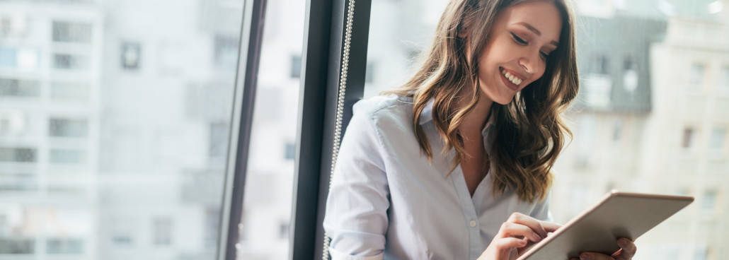 woman looking at a tablet