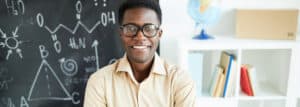 Man standing in front of a chalkboard