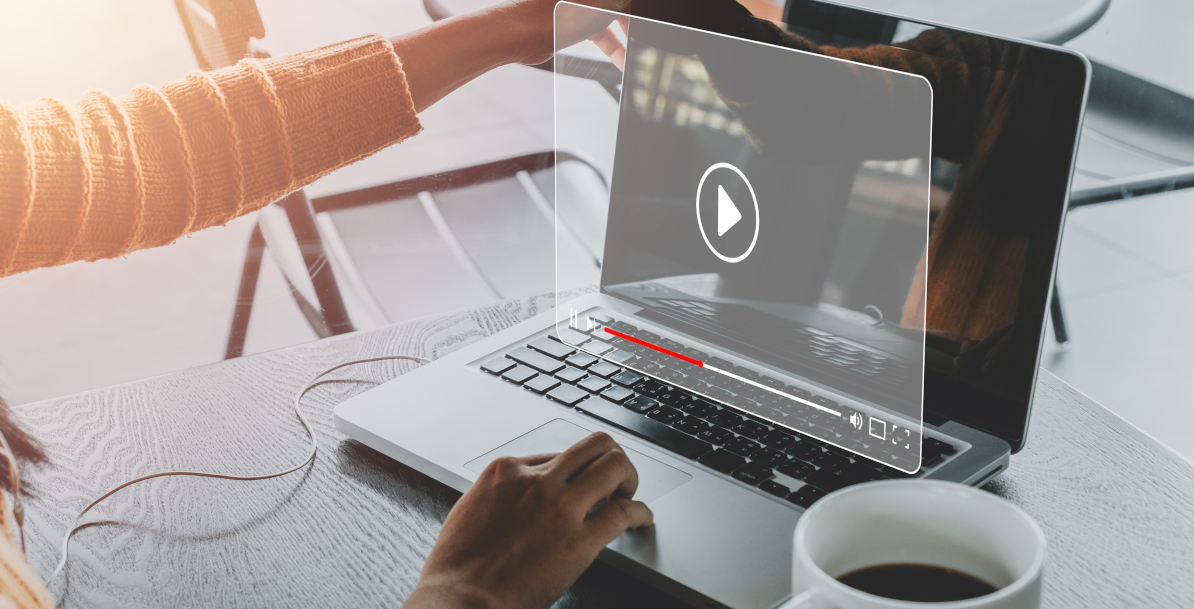 Woman watching online movie or TV series on laptop computer