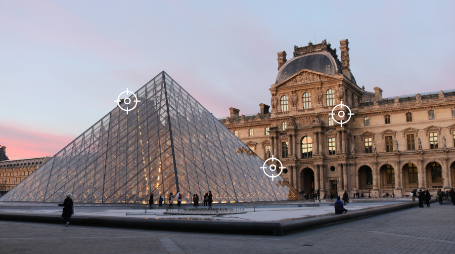 Picture of the louvre in Paris with hotspots on it.