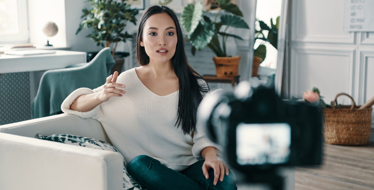 Women talking into a video camera