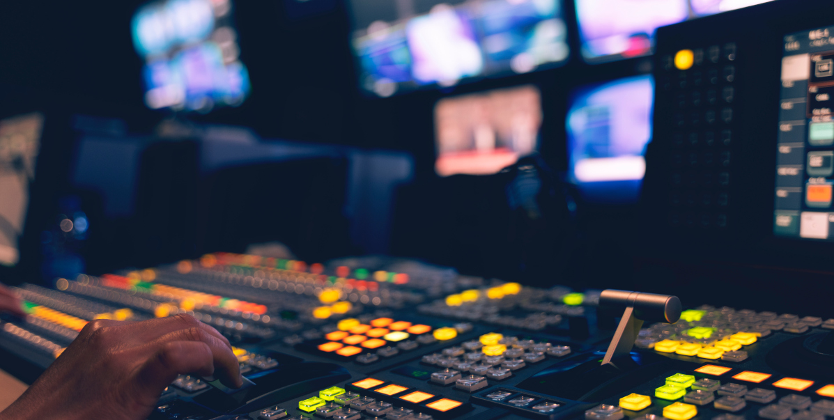 Person's hand using video editing equipment