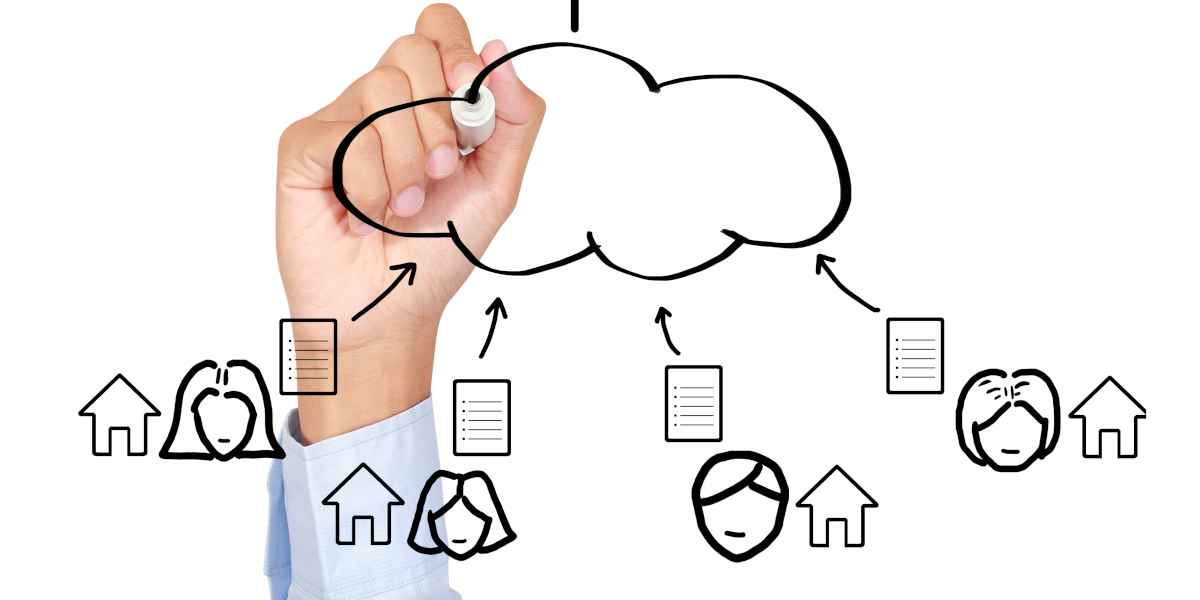 Hand writing on a whiteboard showing cloud computing